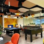 High-ceiling space treated with modular DecraCloud cluster