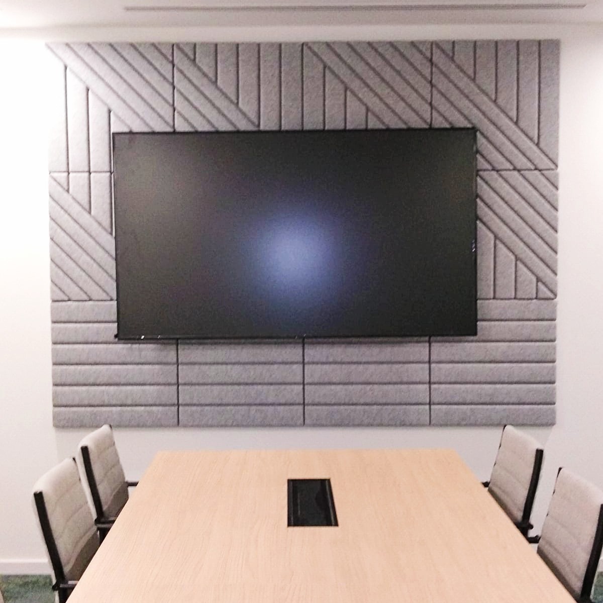 Boardroom with Decrasound 3D acoustic panels applied to rear wall for echo control