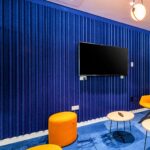 Soft curved acoustic wall panels in education space