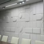 Decrasound Layer 3D acoustic wall panels installed in a modern meeting room providing decorative sound absorption and contemporary interior design.