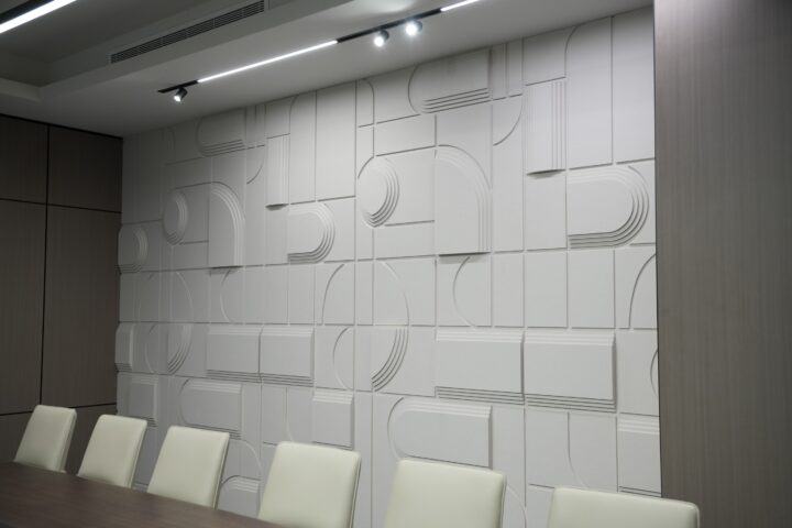Decrasound Layer 3D acoustic wall panels installed in a modern meeting room providing decorative sound absorption and contemporary interior design.