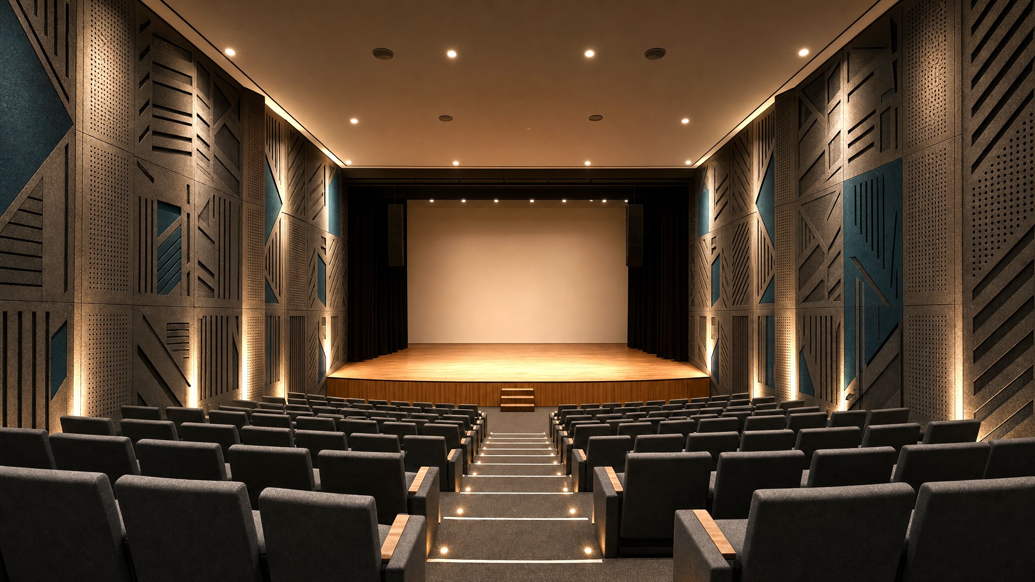 Custom CNC-cut PET acoustic wall panels installed as a feature wall in a modern performing arts auditorium