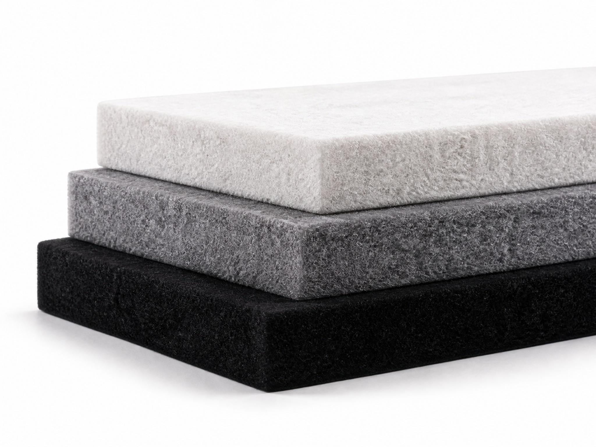 Decrabatt 50mm thick 48kg/m³ polyester acoustic insulation batts in white, grey and black for commercial, industrial and HVAC acoustic insulation applications.