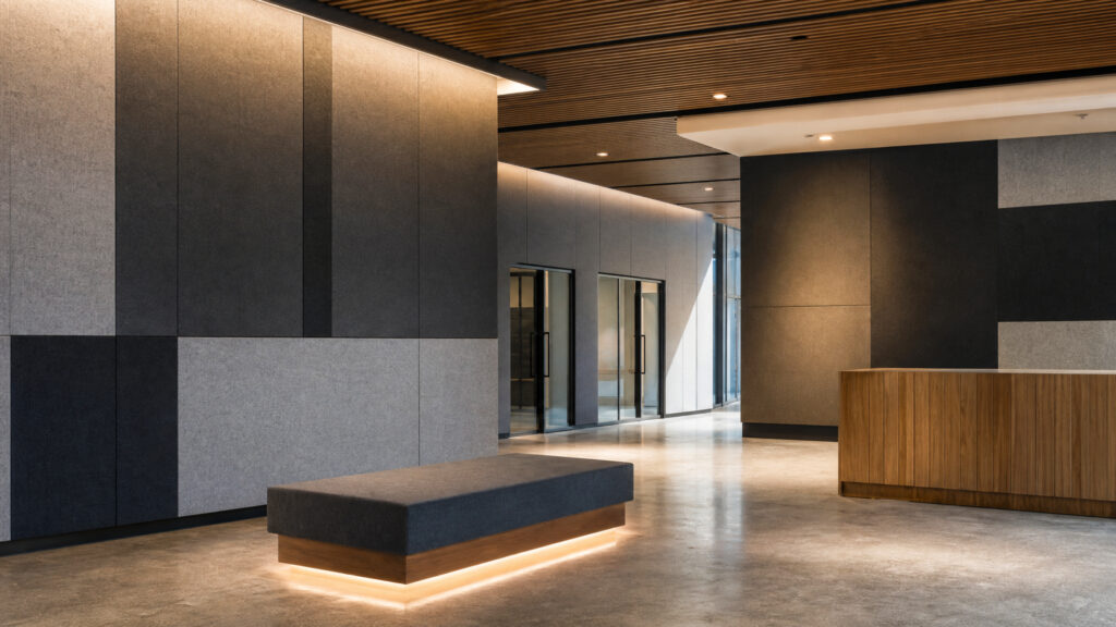 University foyer featuring Decrasound Acoustiscreen PET acoustic wall panels integrated into a contemporary education interior.