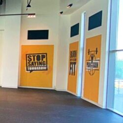 Branded meeting room wall using Acoustiscreen printed acoustic solutions